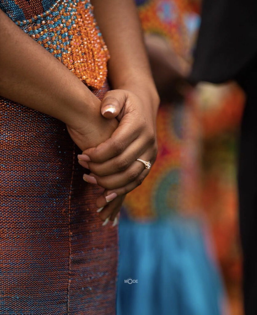 Ghanaian bride wearing a wedding ring on her ring finger