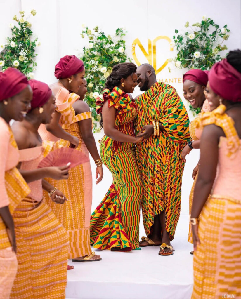 Ghana weddings: Ghanaian couple display their Kente wedding dress in artistic style