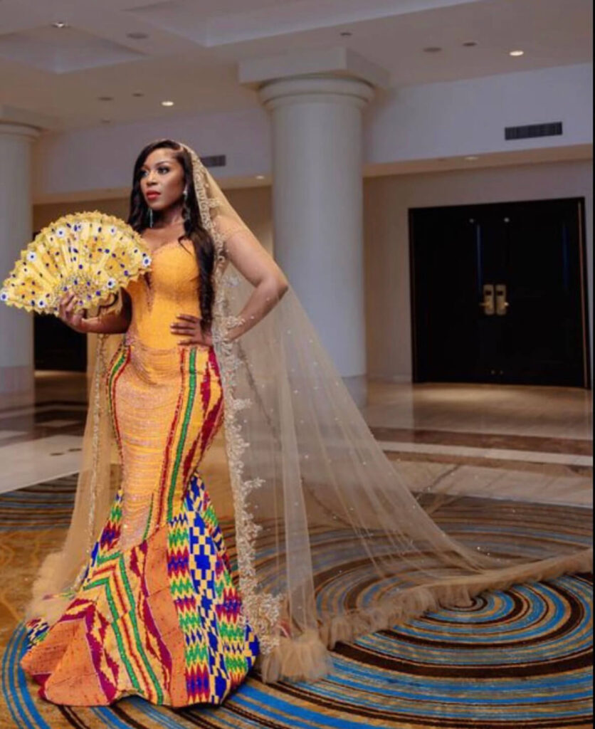 Top Ghanaian wedding dress designers: Kente wedding dress by Sadia Sanusi