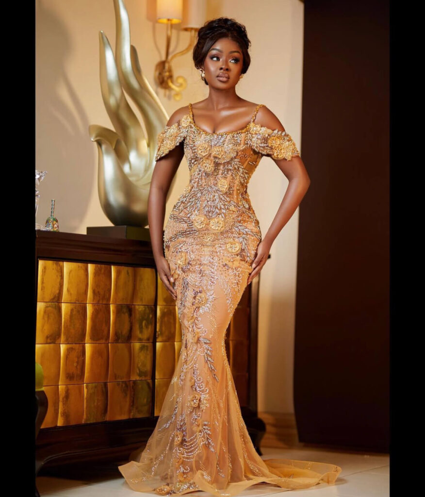 Top Ghanaian wedding dress designers: Kente wedding dress by Moda Bertha
