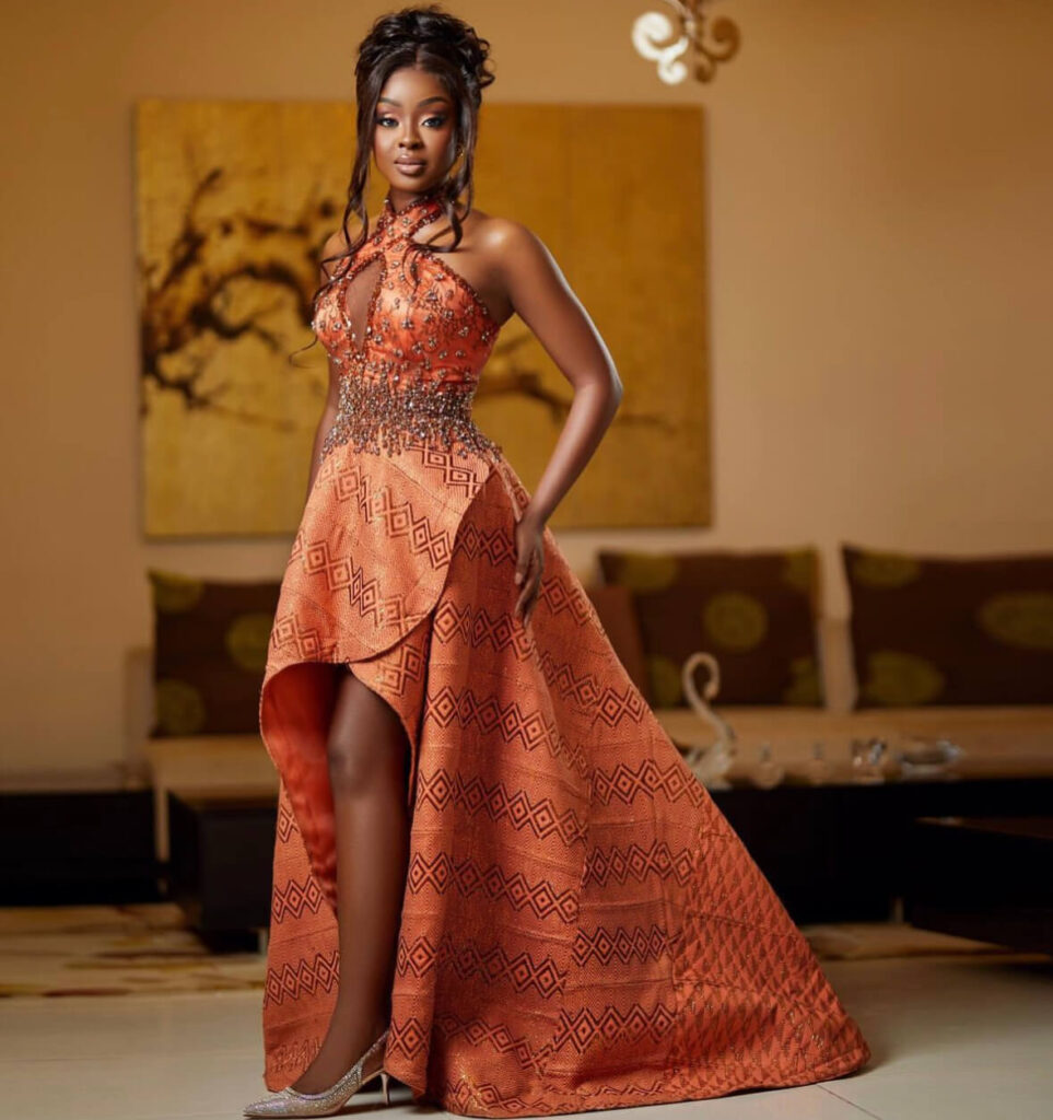 Top Ghanaian wedding dress designers: Kente wedding dress by Moda Bertha